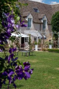 Een tuin van Hôtel Le Clos