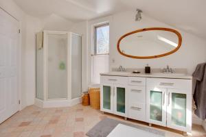 a bathroom with a sink and a mirror at Our Space the Perfect Place B&B in Picton