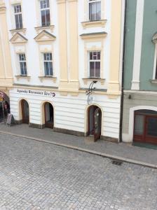 a building on the side of a street at Hotel U Zlateho Andela in Pardubice