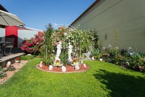 Sodas prie apgyvendinimo įstaigos Auszeit Leoben 3 mit Gartenterasse und Gratisparkplatz