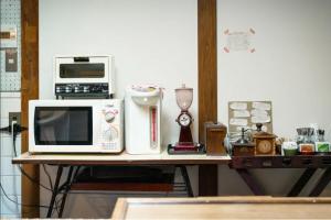 A kitchen or kitchenette at Guest House Koiya