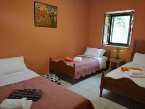 Cama ou camas em um quarto em Rodomelo House - 3 Bedrooms