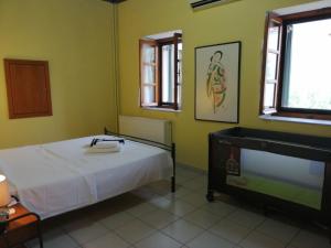 Cama ou camas em um quarto em Rodomelo House - 3 Bedrooms