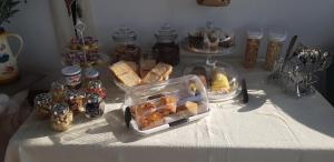 a table with a tray of food on a table at Il fiore di loto in San Felice Circeo