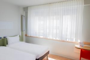 Ibis Budget Braga Centro 객실 침대