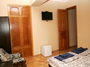 Tempat tidur dalam kamar di Two Towers Guest House