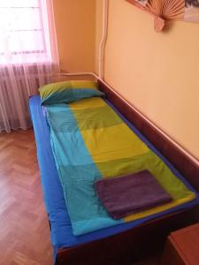 A bed or beds in a room at ZА