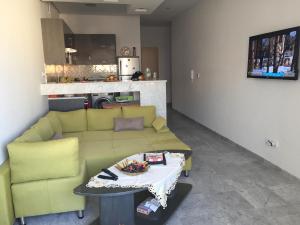 Khu vực ghế ngồi tại Apartment zone touristique 80 m beach free wifi