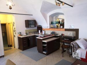 A kitchen or kitchenette at Apartman Korzo