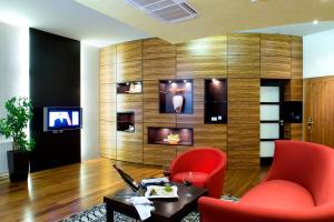 TV in/ali zabaviščno središče v nastanitvi Boutique Hotel Dubná Skala