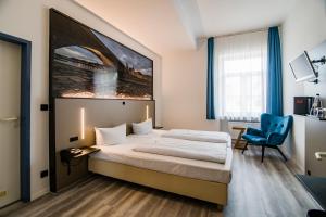 Ліжко або ліжка в номері Hotel Weidenhof