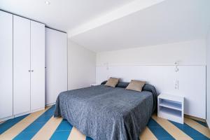 Ліжко або ліжка в номері Apartamentos Sunway Amapola