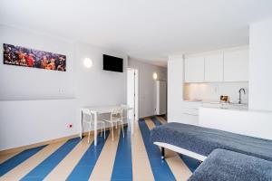 Ліжко або ліжка в номері Apartamentos Sunway Amapola