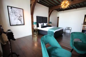 Cama ou camas em um quarto em Boutique Hotel Steenhof Suites - Adults Only