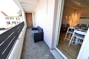 Balkon atau teras di TiAMo Modern Design Guest House