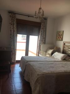 Hotel-Apartamento Carolina y Vanessa 객실 침대