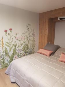 Una cama o camas en una habitación de Caveau de l'ami Fritz