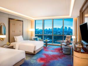 InterContinental Hotels Jakarta Pondok Indah, an IHG Hotel房間的床