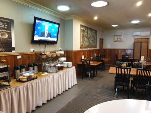 Best Western Endeavour Motel tesisinde bir restoran veya yemek mekanı