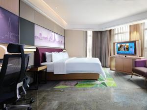 Hampton by Hilton Guangzhou Dongxiaonan tesisinde bir televizyon ve/veya eğlence merkezi