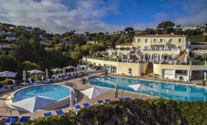 Poolen vid eller i närheten av Althoff Hotel Villa Belrose