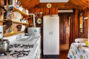 A kitchen or kitchenette at Rustic Rockport Cottage