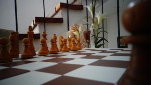 a chess board with chess pieces on top of it at Haus Bergkristall in Längenfeld