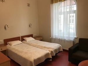 Krevet ili kreveti u jedinici u objektu Hommiku Guesthouse