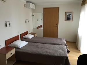 Krevet ili kreveti u jedinici u objektu Hommiku Guesthouse