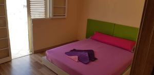 Ein Bett oder Betten in einem Zimmer der Unterkunft "Flora B&B "- Rooms in Privat Home