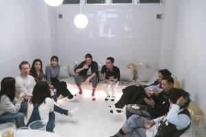 a group of people sitting in a room at TSUKIMI HOTEL in Kyoto