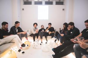 a group of people sitting in a room at TSUKIMI HOTEL in Kyoto