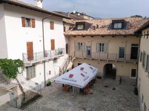 an overhead view of a building with a tent in the courtyard at La Corte Room & Relax in Rovereto