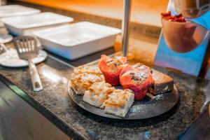 a plate of food on top of a counter at MEAT UND STAY Hotel in Haar