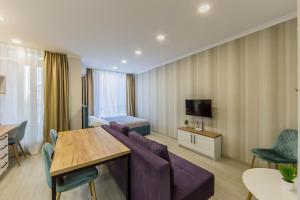 TV i/ili multimedijalni sistem u objektu Comfort Town Love Home