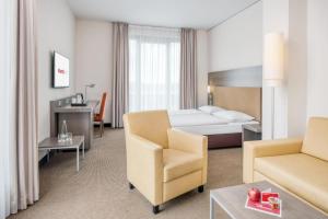 Voodi või voodid majutusasutuse IntercityHotel Dresden toas