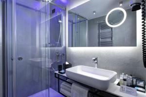 Un baño de iQ Hotel Milano