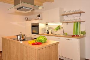 Una cocina o kitchenette en Rumlhof