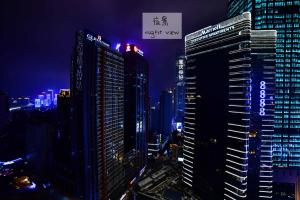 a city skyline at night with tall buildings at 弱水咖啡国际青旅Only Cafe and Backpacker in Chongqing