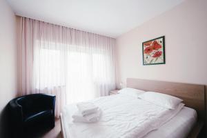 Una cama o camas en una habitación de Hotel - Pension Vesta