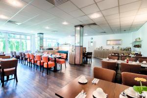 Restaurant o un lloc per menjar a ACHAT Hotel Stuttgart Zuffenhausen