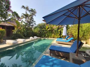 Piscina a Cafe Wayan Cottages Senggigi o a prop