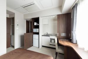 Kuhinja ili čajna kuhinja u objektu Hotel Classe Stay Sapporo