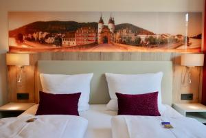 Postelja oz. postelje v sobi nastanitve Rafaela Hotel Heidelberg