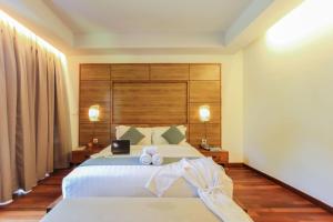 djabu Canggu Beach Villa में एक कमरे में एक या कई बेड