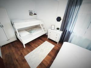 Una cama o camas en una habitación de APARTMAN LINDA - VEĽKÁ LOMNICA