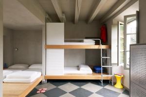 Una cama o camas en una habitación de Combo Milano