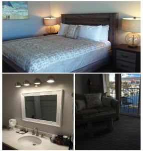 um quarto com uma cama, um lavatório e um espelho em Astoria Riverwalk Inn em Astoria, Oregon