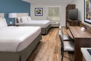 Krevet ili kreveti u jedinici u objektu Woodspring Suites Cherry Hill