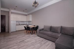 Кухня или мини-кухня в Apartment Didveli 7
